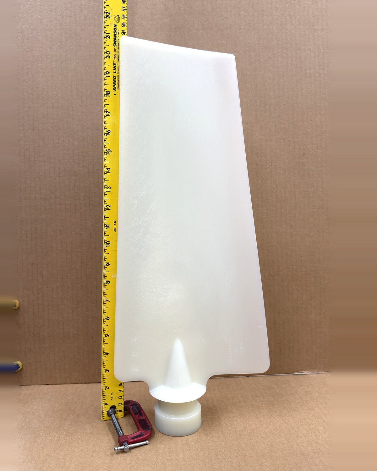 Multiwing 6WL fan blade next to a tape measure for length