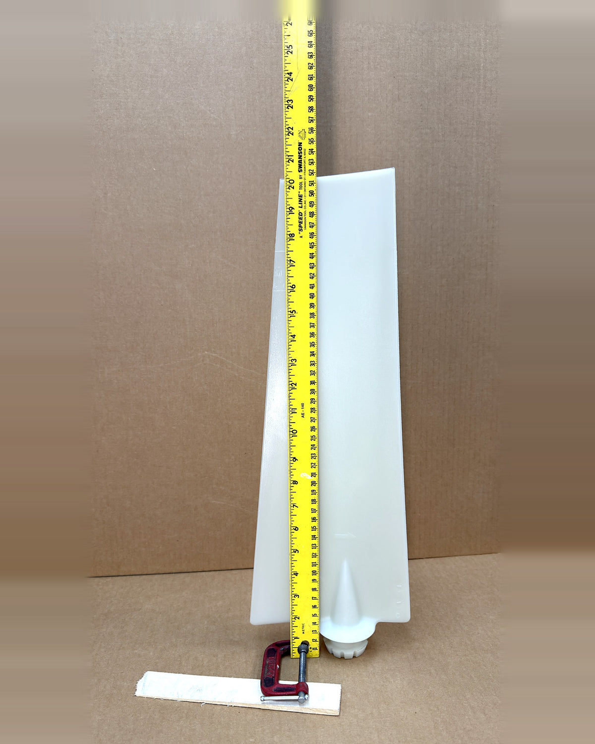 Wing Fan P6ZR fan blade, uncut, with tape measure showing length
